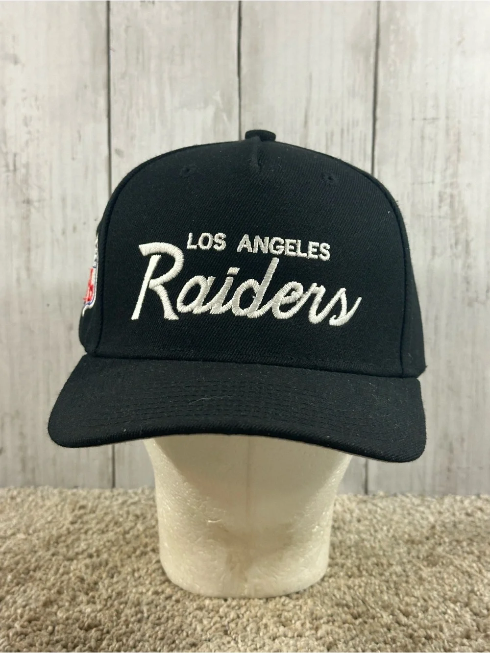 Mitchell & Ness NFL Los Angeles Raiders Script Snapback Men’s Hat
